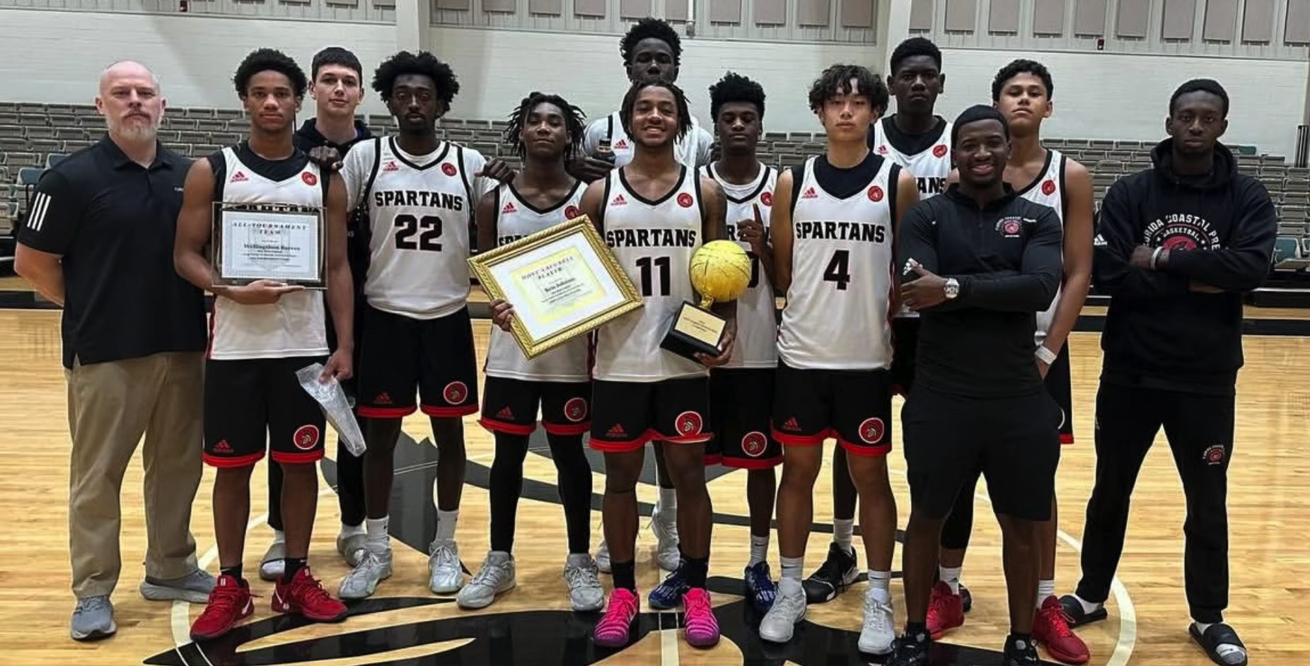 Florida Coastal Prep Spartans with tournament awards after competing as a team